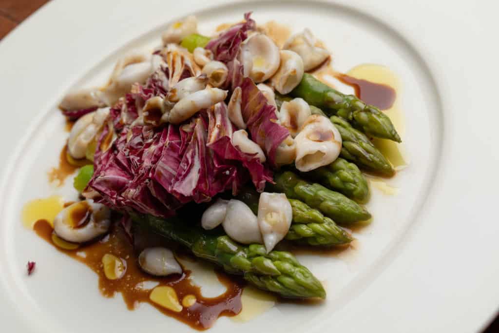 COOKED ASPARAGUS, RADICCHIO AND BABY SQUID SALAD WITH BALSAMIC VINEGAR DRESSING AND CRISPY PLANTAIN